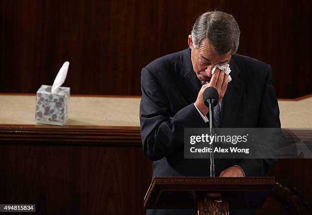 Outgoing U.S. Speaker of the House Rep. John Boehner wipes his eye as he gives his farewell speech in the House Chamber of the Capitol October 29,...