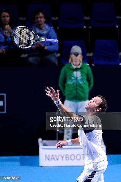 Teymuraz Gabashvili of Russia throws up his racket during the second day of the Swiss Indoors ATP 500 tennis tournament against Marin Cilic of...