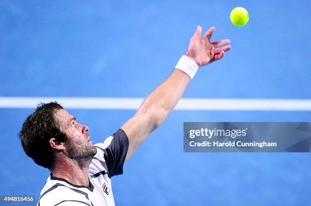 Teymuraz Gabashvili of Russia serves during the second day of the Swiss Indoors ATP 500 tennis tournament against Marin Cilic of Croatia at St...