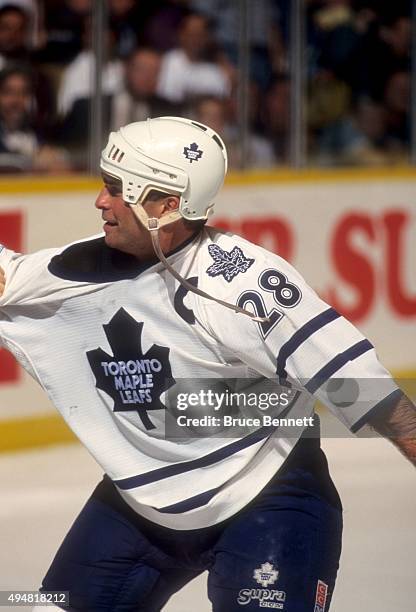 Tie Domi of the Toronto Maple Leafs fights during an NHL preseason game in September, 1998 at the Maple Leaf Gardens in Toronto, Ontario, Canada.