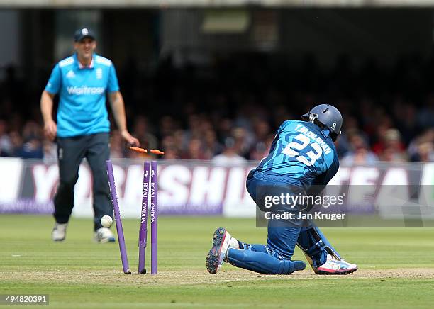 Tillakaratne Dilshan of Sri Lanka is bowled by James Anderson of England attempting a sweep during the 4th Royal London One Day International match...