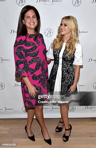At Draper James Andrea Hyde and Reese Witherspoon attend the Draper James Nashville store opening on October 28, 2015 in Nashville, Tennessee.