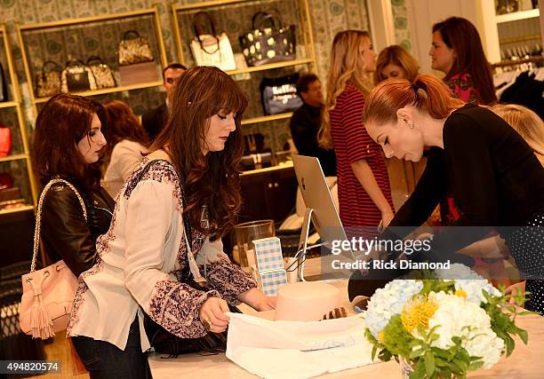 Guests attend the Draper James Nashville store opening on October 28, 2015 in Nashville, Tennessee.