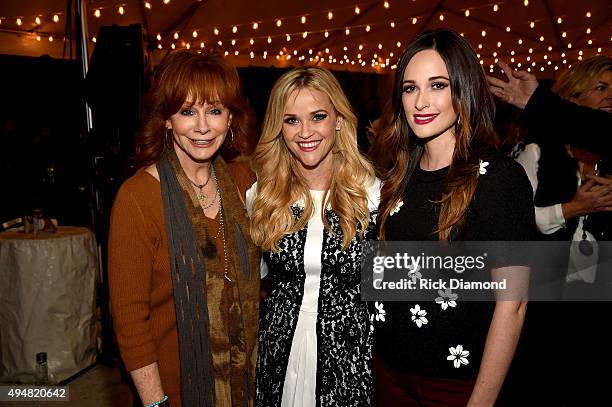 Reba McEntire, Reese Witherspoon, and Kacey Musgraves attend the Draper James Nashville store opening on October 28, 2015 in Nashville, Tennessee.