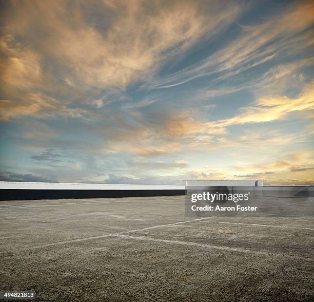 roof top of a car park - cloud sky dusk stock pictures, royalty-free photos & images