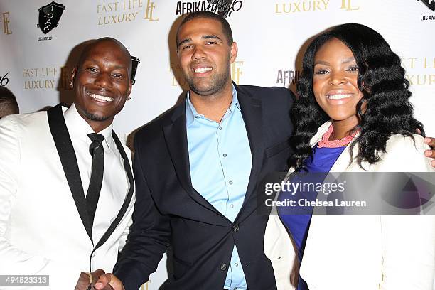 Singer / actor Tyrese Gibson, Prophet Walker and Compton mayor Aja Brown arrive at the For Our Girls of Nigeria benefit concert hosted by...