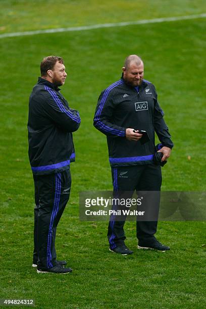 Wyatt Crockett and Tony Woodcock of the All Blacks look on during a New Zealand All Blacks training session on October 29, 2015 in Bagshot, United...