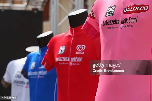The Maglia Bianca, Maglia Azzurra, Maglia Rossa and Maglia Rosa 2014 Giro d'Italia jerseys are seen on display prior to the twentieth stage of the...