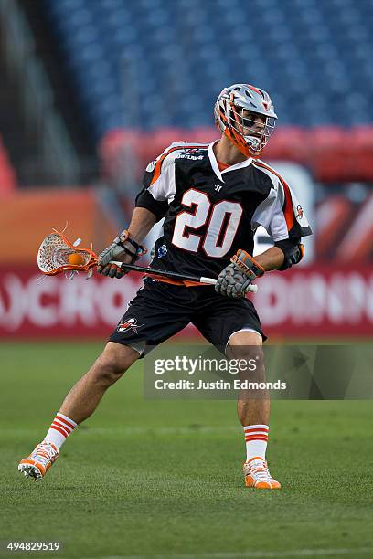 Jeremy Sieverts of the Denver Outlaws in action against the Charlotte Hounds at Sports Authority Field at Mile High on May 30, 2014 in Denver,...