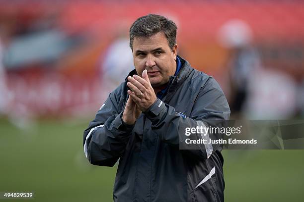 Head Coach Mike Cerino of the Charlotte Hounds coaches from the sideline against the Denver Outlaws at Sports Authority Field at Mile High on May 30,...