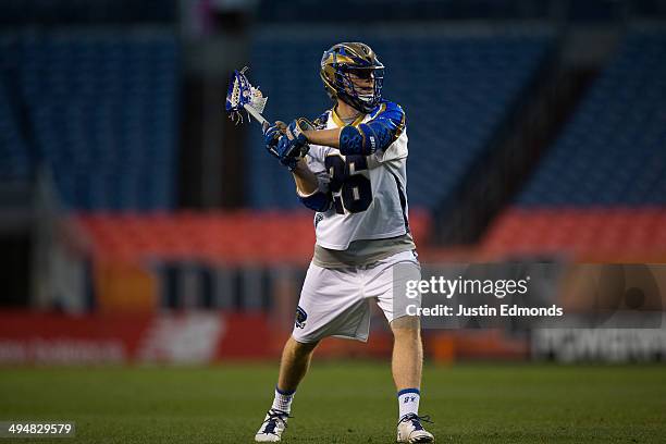 John Haus of the Charlotte Hounds in action against the Denver Outlaws at Sports Authority Field at Mile High on May 30, 2014 in Denver, Colorado....