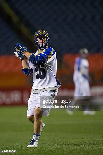 John Haus of the Charlotte Hounds in action against the Denver Outlaws at Sports Authority Field at Mile High on May 30, 2014 in Denver, Colorado....