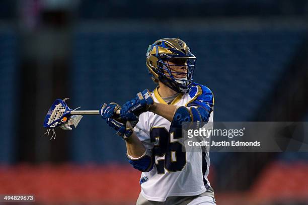 John Haus of the Charlotte Hounds in action against the Denver Outlaws at Sports Authority Field at Mile High on May 30, 2014 in Denver, Colorado....