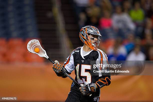 Eric Law of the Denver Outlaws in action against the Charlotte Hounds at Sports Authority Field at Mile High on May 30, 2014 in Denver, Colorado. The...