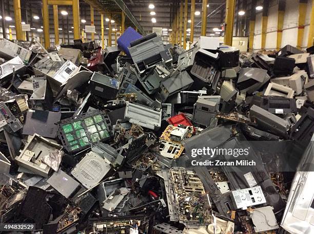 Electronic waste awaiting to be dismantles as electronic recyclable waste at the Electronic Recyclers International plant in Holliston,...