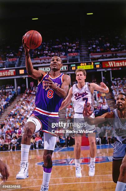 Eddie Johnson of the Phoenix Suns shoots against the Sacramento Kings circa 1990 at Arco Arena in Sacramento, California. NOTE TO USER: User...