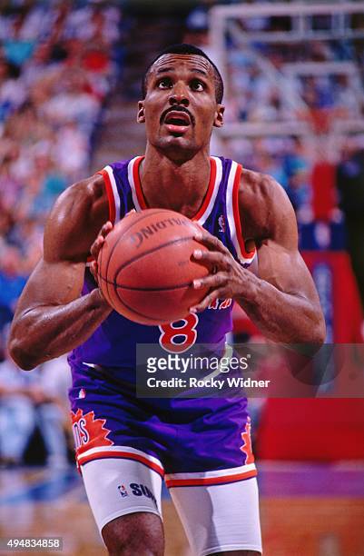 Eddie Johnson of the Phoenix Suns shoots a foul shot against the Sacramento Kings circa 1990 at Arco Arena in Sacramento, California. NOTE TO USER:...