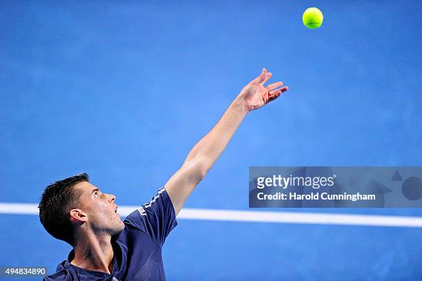 Dominic Thiem of Austria serves during the second day of the Swiss Indoors ATP 500 tennis tournament against Richard Gasquet of France at St...