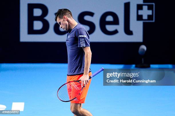 Dominic Thiem of Austria looks dejected after missing a point during the second day of the Swiss Indoors ATP 500 tennis tournament against Richard...