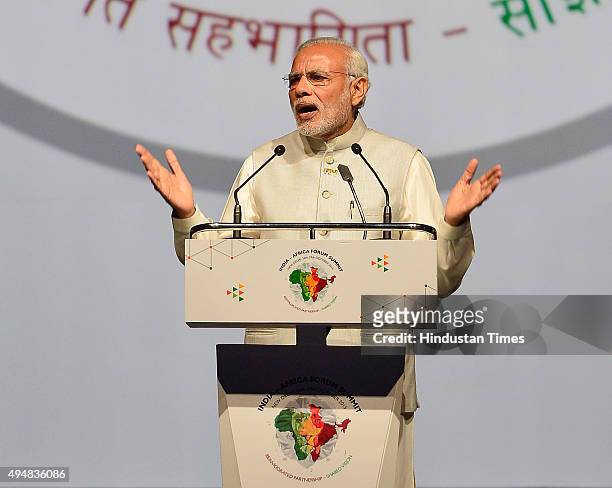 Prime Minister Narendra Modi addresses the African Heads of State and leaders during the India-Africa Forum Summit at Indira Gandhi Sports Complex on...