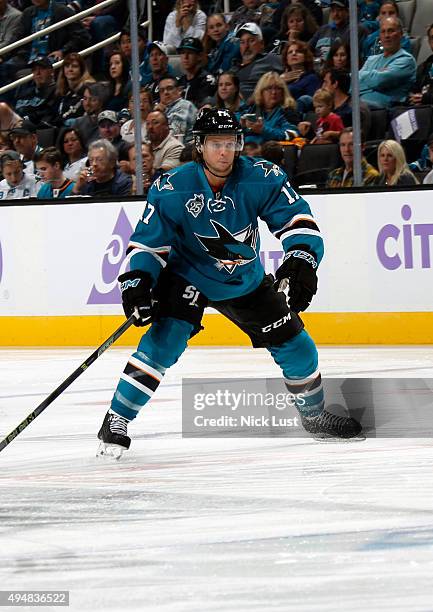 John McCarthy of the San Jose Sharks gets in position for a pass against the Carolina Hurricanes during a NHL game at the SAP Center at San Jose on...