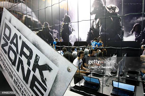 Gamers play the video game "Tom Clancy's The Division" developed by Ubisoft at Paris Games Week, a trade fair for video games on October 29, 2015 in...