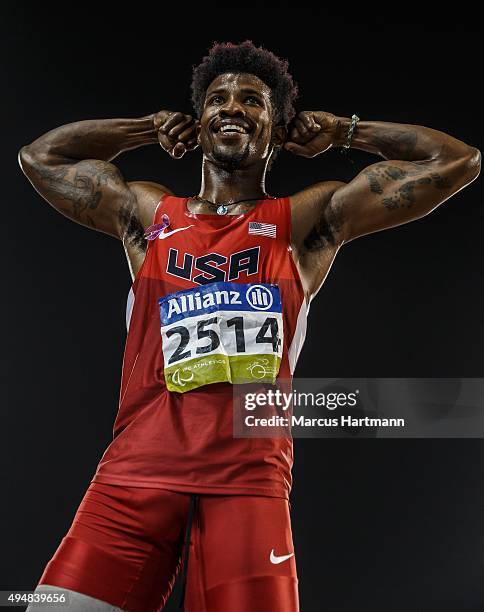 October 29: Richard Browne of the United States celebrates setting a new world record and winning the men's 100m T44 final during the Evening Session...