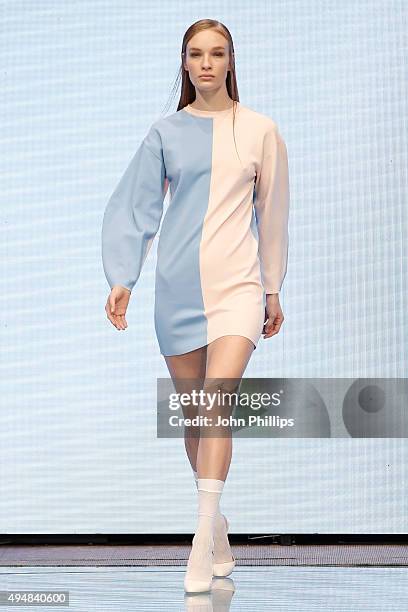 Model walks the runway at the Arthur Arbesser show as part of the Talents Fashion show during the Vogue Fashion Dubai Experience 2015 at The Dubai...
