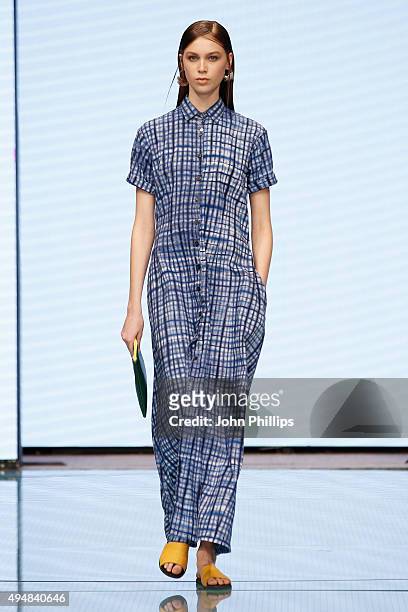 Model walks the runway at the Studio One Eighty Nine show as part of the Talents Fashion show during the Vogue Fashion Dubai Experience 2015 at The...