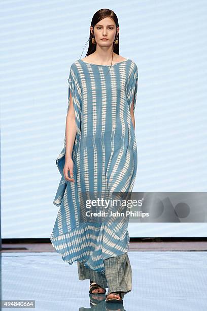 Model walks the runway at the Studio One Eighty Nine show as part of the Talents Fashion show during the Vogue Fashion Dubai Experience 2015 at The...