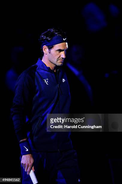 Roger Federer of Switzerland arrives on the center court during the fourth day of the Swiss Indoors ATP 500 tennis tournament against Philipp...