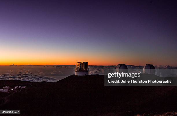 As Night Falls on the Subaru, Keck I and Keck II Telescopes at the Summit of the Mauna Kea Observatories on the Big Island of Hawaii