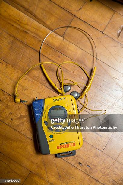 Old Yellow Sony Sports Walkman Music Cassette Tape Player and Headphones