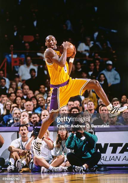 Kobe Bryant of the Los Angeles Lakers rebounds against the Minnesota Timberwolves in his first regular season game on November 3, 1996 at The Forum...