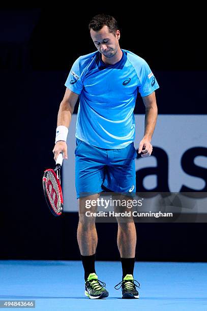 Philipp Kohlschreiber of Germany looks dejected after loosing a point during the fourth day of the Swiss Indoors ATP 500 tennis tournament against...