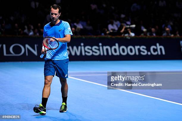 Philipp Kohlschreiber of Germany looks dejected after loosing a point during the fourth day of the Swiss Indoors ATP 500 tennis tournament against...