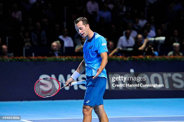 Philipp Kohlschreiber of Germany looks dejected after loosing a point during the fourth day of the Swiss Indoors ATP 500 tennis tournament against...