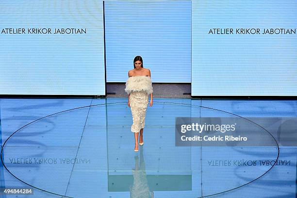 Model walks the runway at the Talents Fashion show during the Vogue Fashion Dubai Experience 2015 at The Dubai Mall on October 29, 2015 in Dubai,...