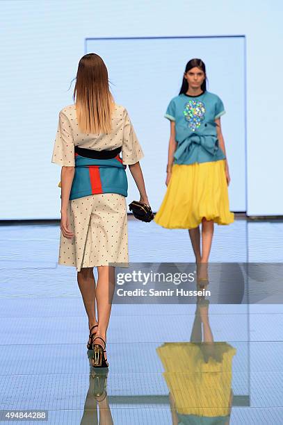 Model walks the runway at the Talents Fashion show during the Vogue Fashion Dubai Experience 2015 at The Dubai Mall on October 29, 2015 in Dubai,...