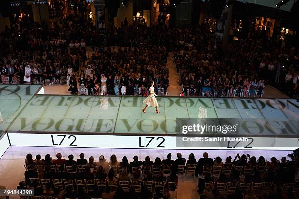 Model walks the runway at the Talents Fashion show during the Vogue Fashion Dubai Experience 2015 at The Dubai Mall on October 29, 2015 in Dubai,...