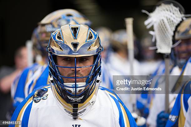 Adam Ghitelman of the Charlotte Hounds looks on before a game against the Denver Outlaws at Sports Authority Field at Mile High on May 30, 2014 in...