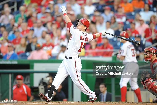 Nate McLouth of the Washington Nationals takes a swing during a game against the Cincinnati Reds on May 19, 2014 at Nationals Park in Washington, DC....