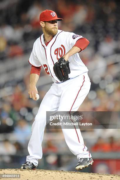 Ryan Mattheus of the Washington Nationals pitches during a game against the Cincinnati Reds on May 19, 2014 at Nationals Park in Washington, DC. The...