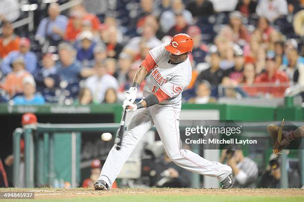 Roger Bernadina of the Cincinnati Reds takes a swing during a game against the Washington Nationals on May 19, 2014 at Nationals Park in Washington,...