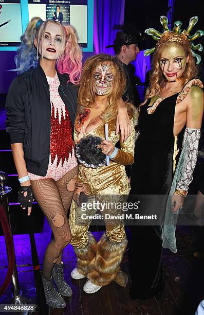 Poppy Delevingne, Charlotte Emma Freud and Camilla Al Fayed attend The Unicef UK Halloween Ball, raising vital funds to support Unicef's life-saving...