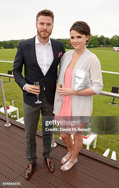 Rick Edwads and Emer Kenny attend day one of the Audi Polo Challenge at Coworth Park Polo Club on May 31, 2014 in Ascot, England.