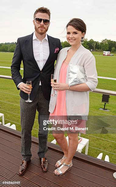 Rick Edwads and Emer Kenny attend day one of the Audi Polo Challenge at Coworth Park Polo Club on May 31, 2014 in Ascot, England.