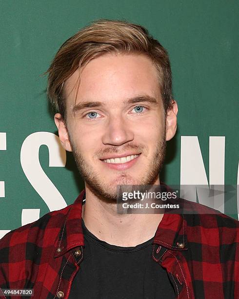 Author/media personality PewDiePie poses for a photo at an book signing for his book "This Book Loves You" at Barnes & Noble Union Square on October...