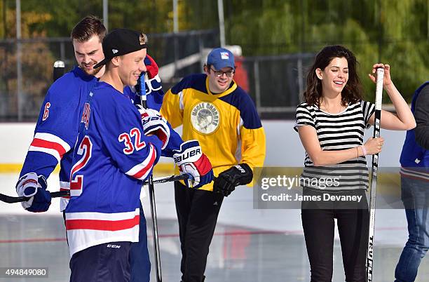 Dylan McIlrath, Antti Raanta, Mark Gessner and Lindsey Broad attend the New York Rangers and the Cast of IFCÕs Hockey Comedy Benders Face Off event...