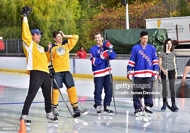 Mark Gessner, Andrew Schulz, Jarrett Stoll, Emerson Etem and Lindsey Broad attend the New York Rangers and the Cast of IFCÕs Hockey Comedy Benders...